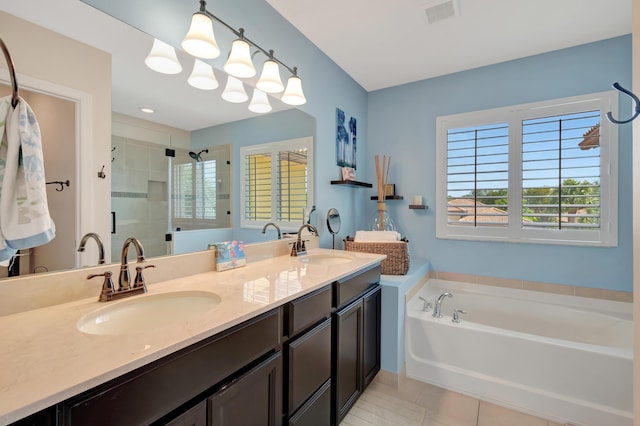 5014 Manchia Dr, Lake Worth, FL 33463 - bathroom with a stall shower, a bath, plenty of natural light, and double vanity