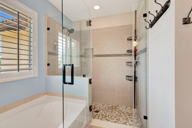 5014 Manchia Dr, Lake Worth, FL 33463 - full bath with a garden tub, a stall shower, and recessed lighting