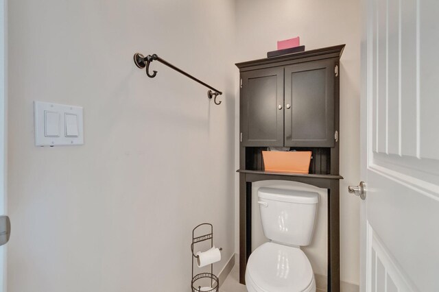 5014 Manchia Dr, Lake Worth, FL 33463 - bathroom featuring toilet and baseboards