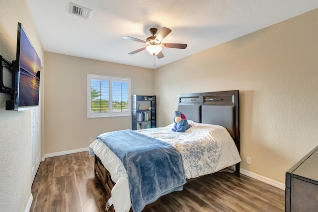 5014 Manchia Dr, Lake Worth, FL 33463 - bedroom with wood finished floors, baseboards, and ceiling fan
