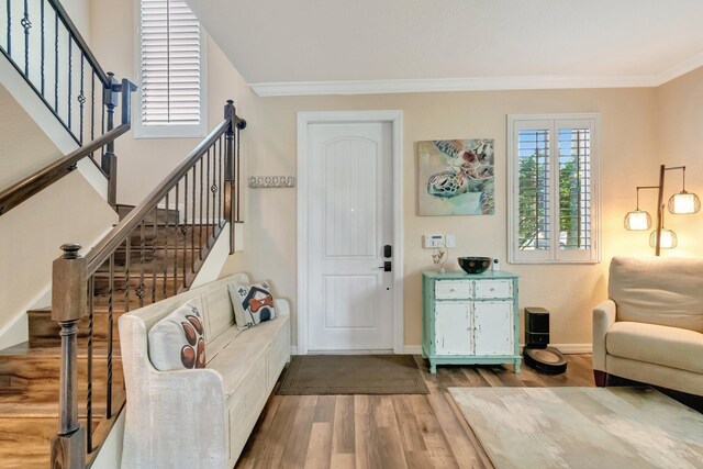 5014 Manchia Dr, Lake Worth, FL 33463 - foyer with wood finished floors, stairway, ornamental molding, and baseboards
