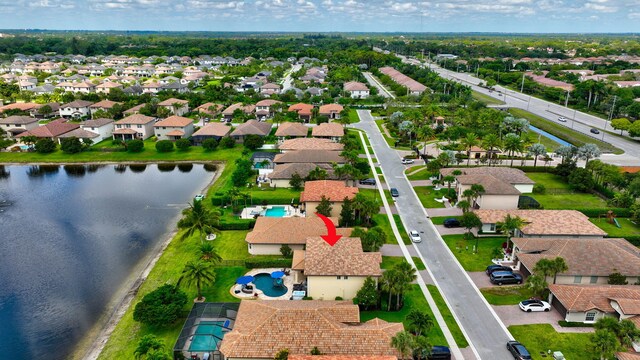 5014 Manchia Dr, Lake Worth, FL 33463 - aerial view of residential area with a large body of water and a pool area