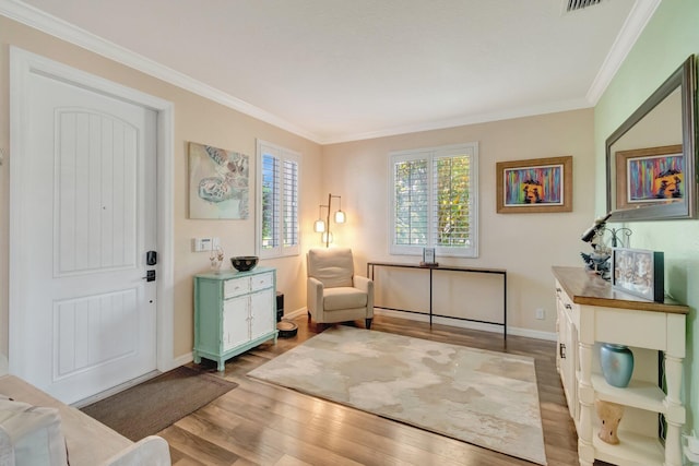 5014 Manchia Dr, Lake Worth, FL 33463 - foyer with wood finished floors, crown molding, and baseboards