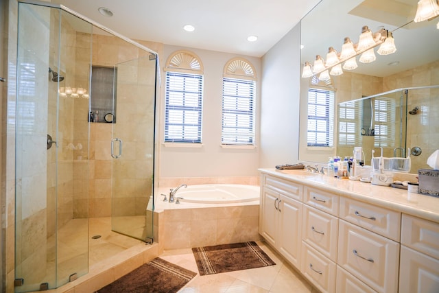 65 NE 4th Ave Unit I, Delray Beach, FL 33483 - full bathroom with a garden tub, vanity, tile patterned flooring, a shower stall, and recessed lighting