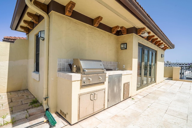 65 NE 4th Ave Unit I, Delray Beach, FL 33483 - view of patio featuring a sink