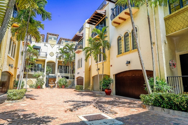 65 NE 4th Ave Unit I, Delray Beach, FL 33483 - view of property with a garage