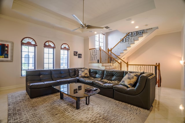 65 NE 4th Ave Unit I, Delray Beach, FL 33483 - tiled living room featuring crown molding, a raised ceiling, ceiling fan, recessed lighting, and stairway