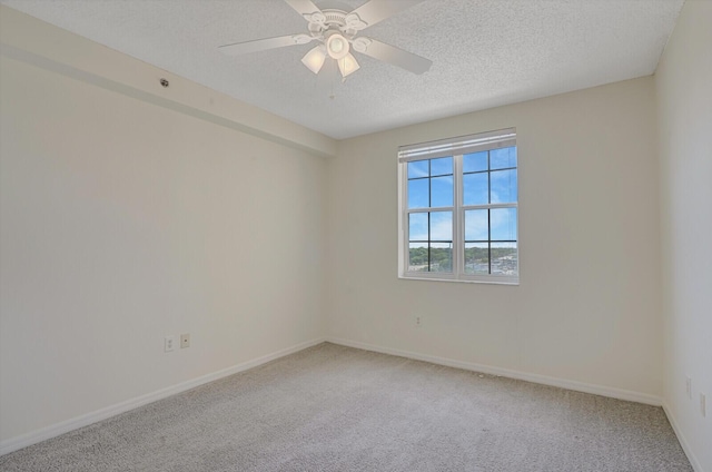 616 Clearwater Park Rd Unit 812, West Palm Beach, FL 33401 - empty room featuring carpet floors, baseboards, a textured ceiling, and a ceiling fan
