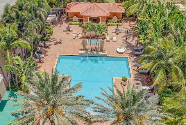 616 Clearwater Park Rd Unit 812, West Palm Beach, FL 33401 - community pool featuring a patio area
