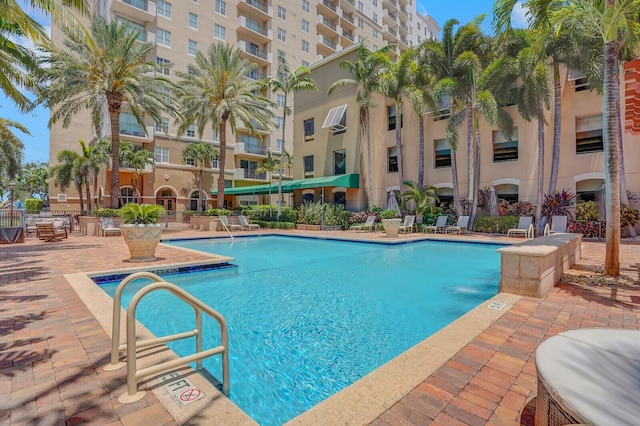 616 Clearwater Park Rd Unit 812, West Palm Beach, FL 33401 - community pool with a patio