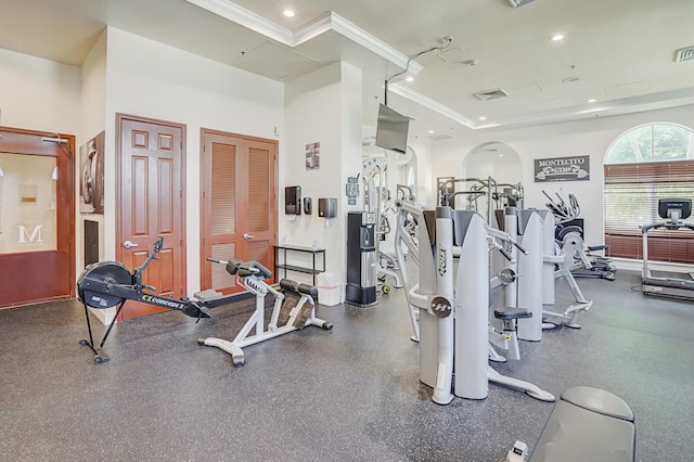 616 Clearwater Park Rd Unit 812, West Palm Beach, FL 33401 - exercise room featuring crown molding, recessed lighting, and a raised ceiling