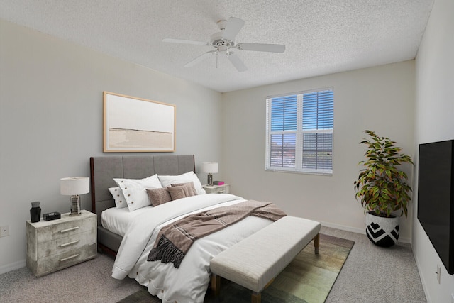 616 Clearwater Park Rd Unit 812, West Palm Beach, FL 33401 - carpeted bedroom featuring a textured ceiling, a ceiling fan, and baseboards
