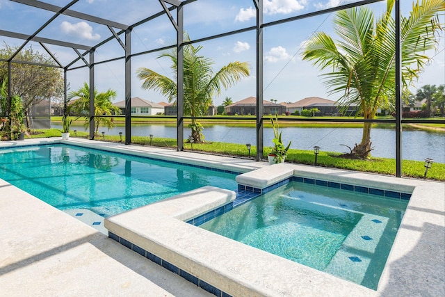 11120 SW Vitalia Ct, Port Saint Lucie, FL 34987 - view of swimming pool featuring a water view, a lanai, a residential view, and a pool with connected hot tub