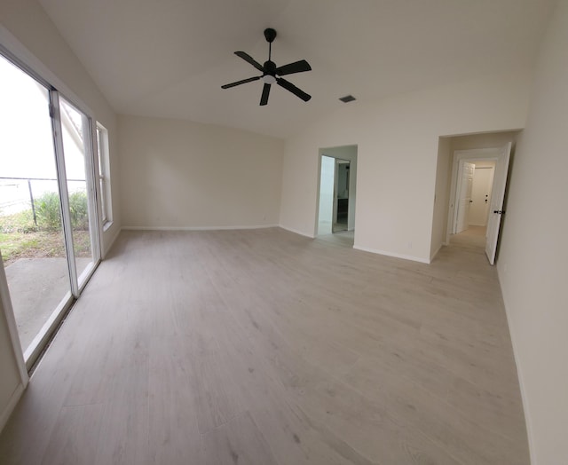 2012 White Coral Ct, Wellington, FL 33414 - spare room featuring lofted ceiling, light wood finished floors, ceiling fan, and baseboards