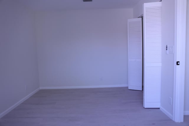 2012 White Coral Ct, Wellington, FL 33414 - unfurnished room with wood finished floors and baseboards