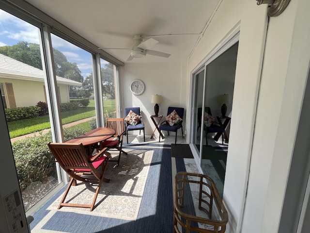 308 Golfview Rd Unit 107, North Palm Beach, FL 33408 - sunroom featuring a ceiling fan