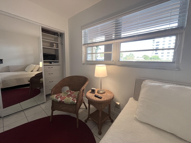 308 Golfview Rd Unit 107, North Palm Beach, FL 33408 - tiled bedroom featuring a closet