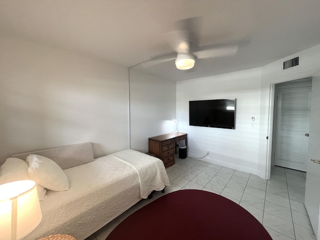 308 Golfview Rd Unit 107, North Palm Beach, FL 33408 - bedroom with ceiling fan