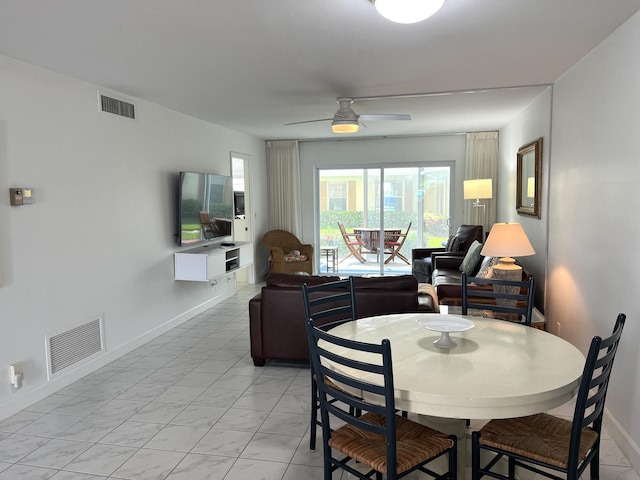 308 Golfview Rd Unit 107, North Palm Beach, FL 33408 - dining space featuring a ceiling fan, baseboards, and light marble finish floors