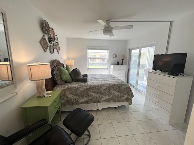 308 Golfview Rd Unit 107, North Palm Beach, FL 33408 - bedroom featuring access to outside and a ceiling fan