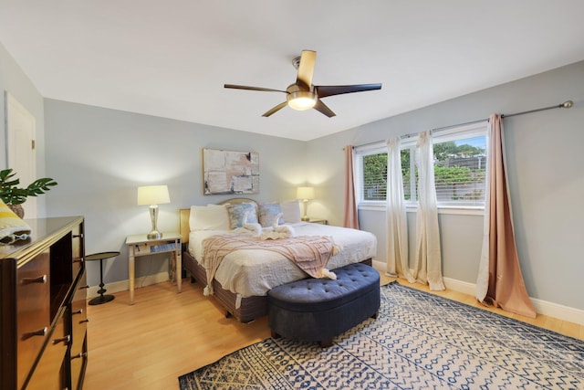 513 Curlew Rd, Delray Beach, FL 33444 - bedroom with light wood finished floors, baseboards, and ceiling fan