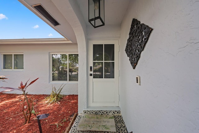513 Curlew Rd, Delray Beach, FL 33444 - entrance to property featuring stucco siding