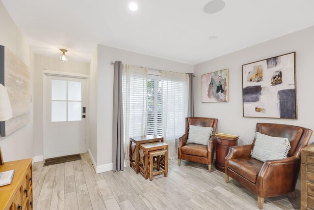 513 Curlew Rd, Delray Beach, FL 33444 - sitting room featuring light wood-style flooring, healthy amount of natural light, and baseboards