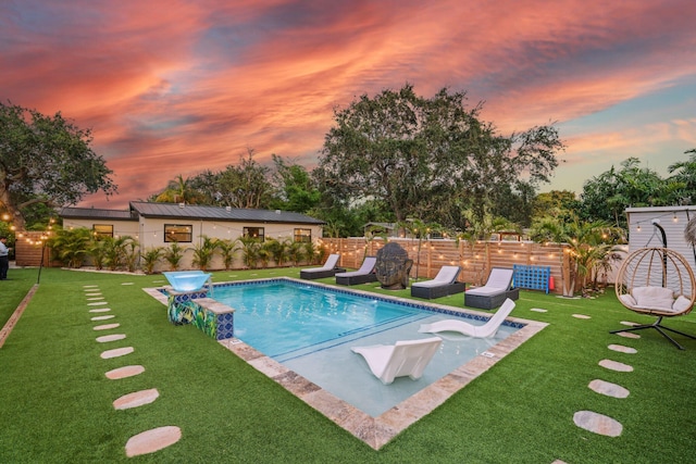1646 NE 3rd Ave, Delray Beach, FL 33444 - pool at dusk with a patio area