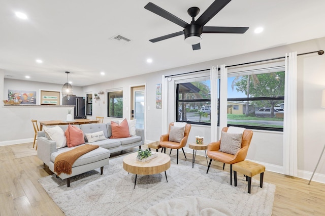1646 NE 3rd Ave, Delray Beach, FL 33444 - living area featuring baseboards, light wood-style flooring, recessed lighting, and a ceiling fan