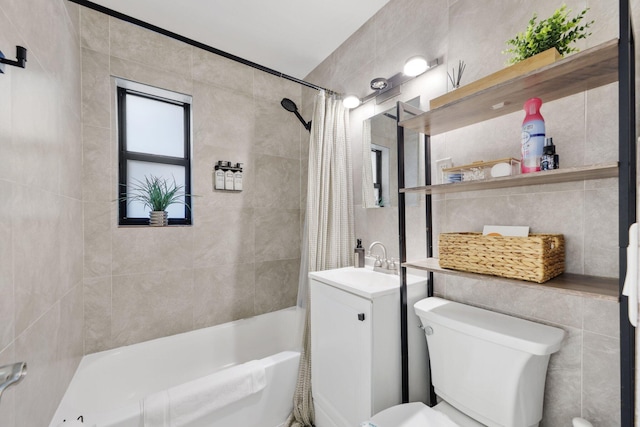 1646 NE 3rd Ave, Delray Beach, FL 33444 - bathroom featuring vanity, shower / bath combo, toilet, and tile walls