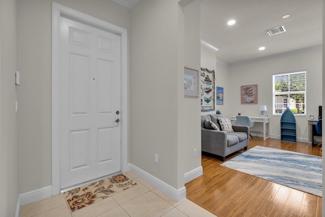 14811 Via Porta, Delray Beach, FL 33446 - entryway featuring baseboards, crown molding, recessed lighting, and light wood-type flooring
