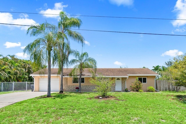 3187 Buccaneer Rd, Lake Worth, FL 33462 - single story home featuring stone siding, concrete driveway, a garage, and stucco siding