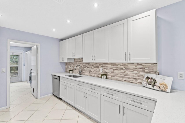 3187 Buccaneer Rd, Lake Worth, FL 33462 - kitchen featuring dishwasher, a sink, backsplash, light countertops, and recessed lighting