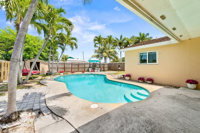 3187 Buccaneer Rd, Lake Worth, FL 33462 - view of pool with a patio area and a fenced backyard