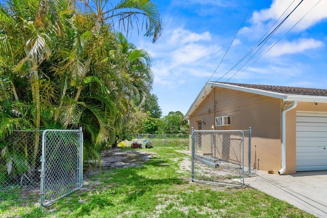 3187 Buccaneer Rd, Lake Worth, FL 33462 - view of yard featuring a gate and an attached garage