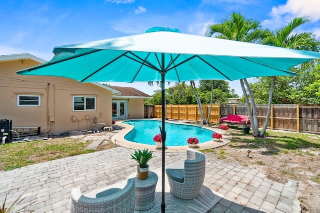 3187 Buccaneer Rd, Lake Worth, FL 33462 - view of swimming pool featuring french doors, a fenced backyard, and a patio area