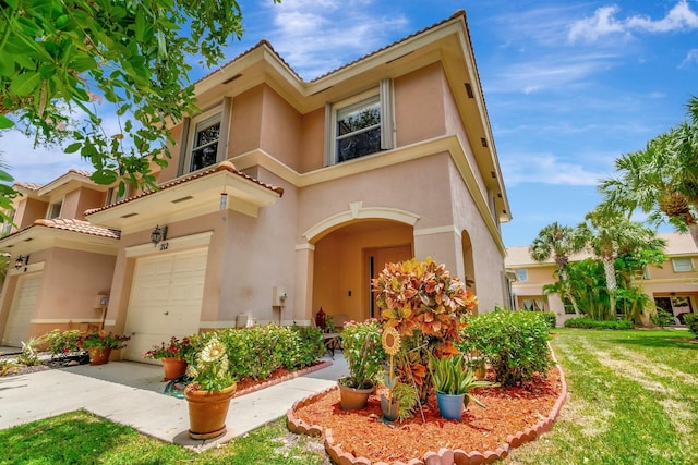 212 River Bluff Ln, Royal Palm Beach, FL 33411 - view of front of house featuring stucco siding, an attached garage, and a front lawn