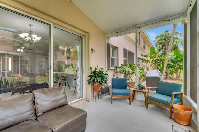 212 River Bluff Ln, Royal Palm Beach, FL 33411 - sunroom with lofted ceiling and a chandelier