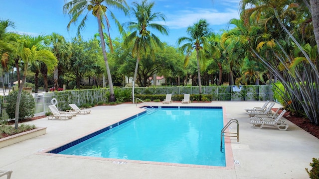 212 River Bluff Ln, Royal Palm Beach, FL 33411 - community pool with a patio