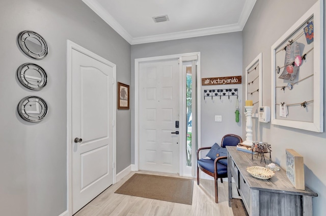 212 River Bluff Ln, Royal Palm Beach, FL 33411 - foyer with light wood finished floors, baseboards, and ornamental molding