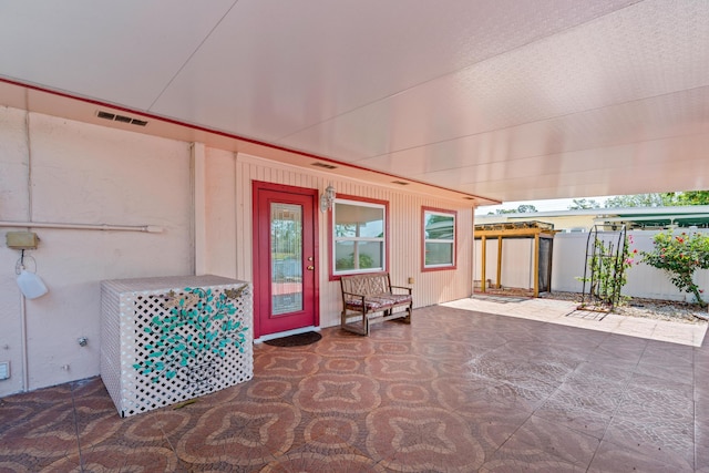 5082 Grant Ln, West Palm Beach, FL 33415 - doorway to property with a patio