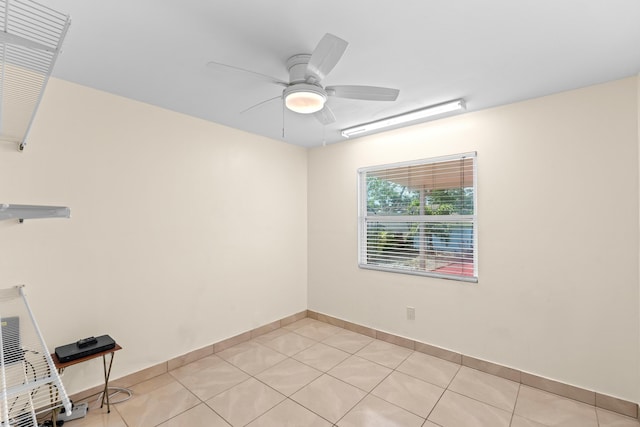 5082 Grant Ln, West Palm Beach, FL 33415 - unfurnished room featuring a ceiling fan, light tile patterned flooring, and baseboards