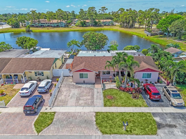 5082 Grant Ln, West Palm Beach, FL 33415 - aerial perspective of suburban area with a nearby body of water