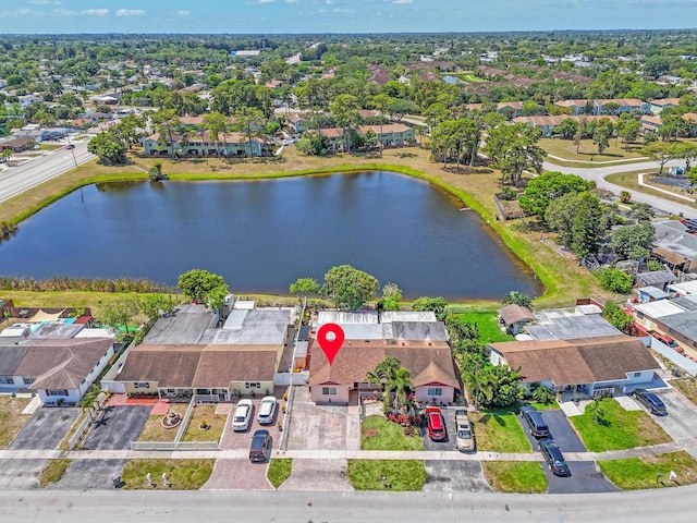 5082 Grant Ln, West Palm Beach, FL 33415 - aerial perspective of suburban area with a nearby body of water