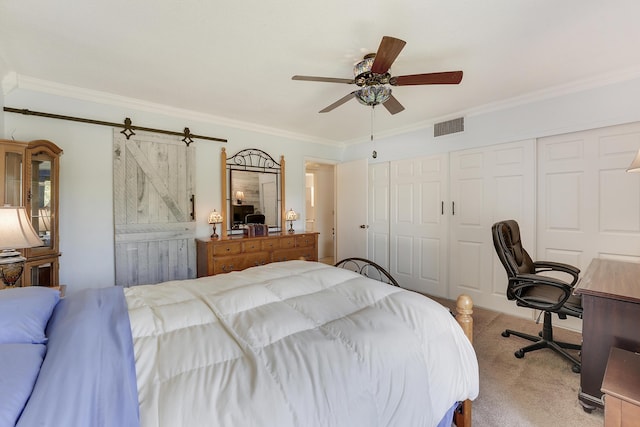 12027 Greenway Cir S Unit 204, Royal Palm Beach, FL 33411 - carpeted bedroom with ornamental molding, a closet, a barn door, and a ceiling fan