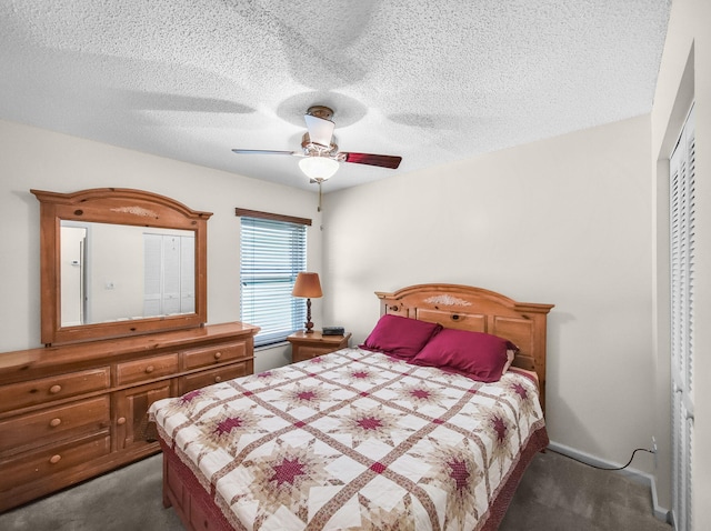 6287 Grand Cypress Cir, Lake Worth, FL 33463 - bedroom with carpet floors, a closet, a textured ceiling, and a ceiling fan