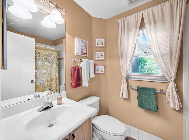 6287 Grand Cypress Cir, Lake Worth, FL 33463 - bathroom featuring toilet, vanity, curtained shower, and tile patterned flooring