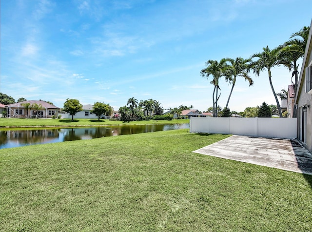 6287 Grand Cypress Cir, Lake Worth, FL 33463 - view of yard featuring a water view, a patio area, and a residential view