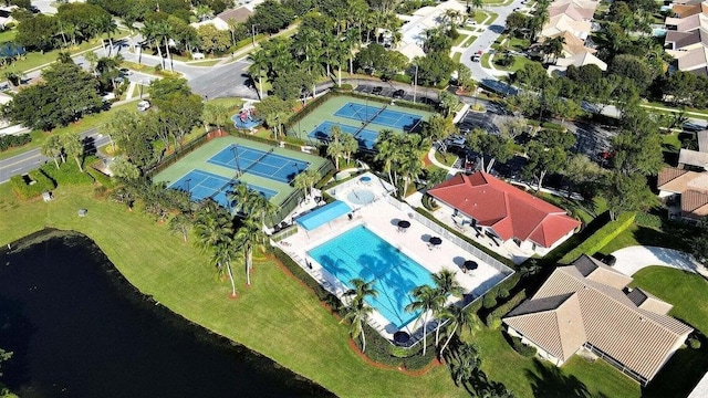 6287 Grand Cypress Cir, Lake Worth, FL 33463 - drone / aerial view of a pool area and a large body of water
