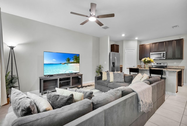 6340 Sailpointe Ln, West Palm Beach, FL 33413 - living area with a ceiling fan, recessed lighting, baseboards, and light tile patterned floors